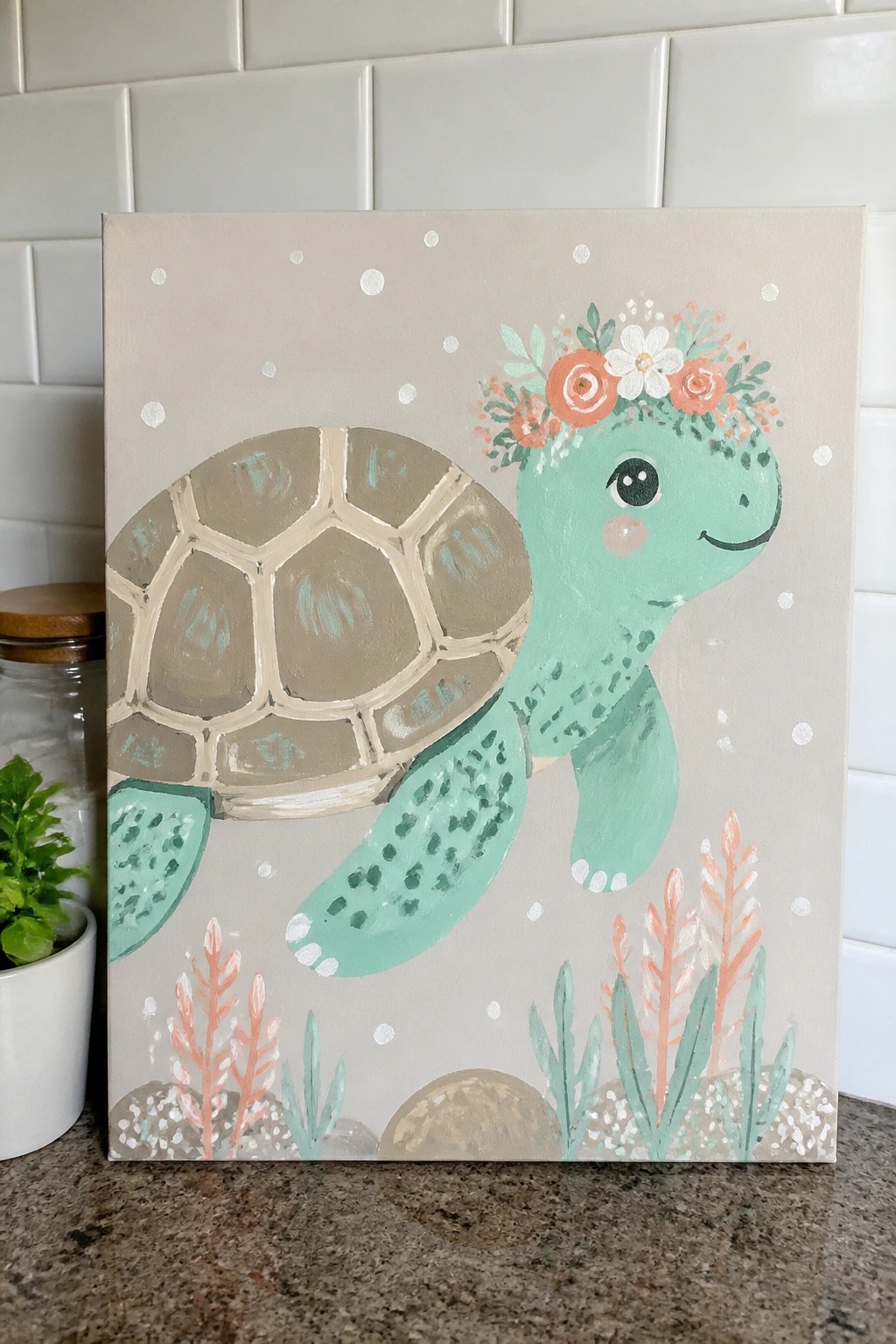 Pastel painting of mint green sea turtle with flower crown on beige canvas