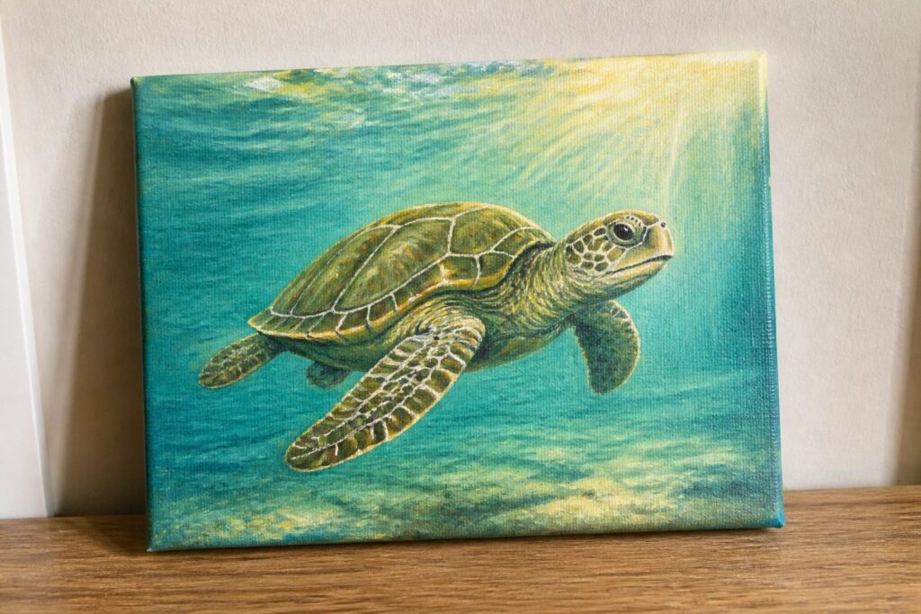 Canvas painting of green sea turtle swimming in sunlit turquoise waters.