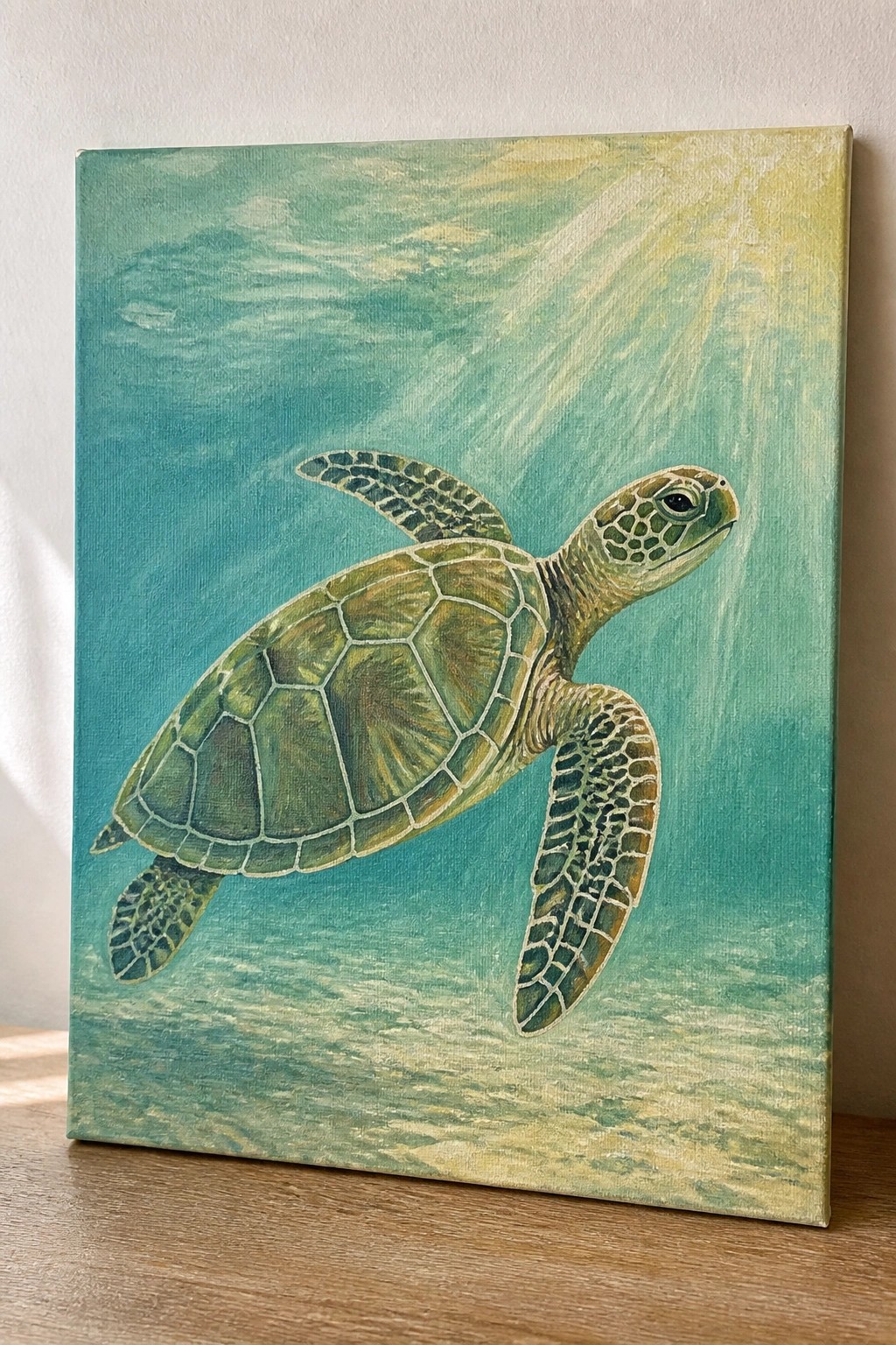 Canvas painting of green sea turtle swimming in sunlit turquoise waters.