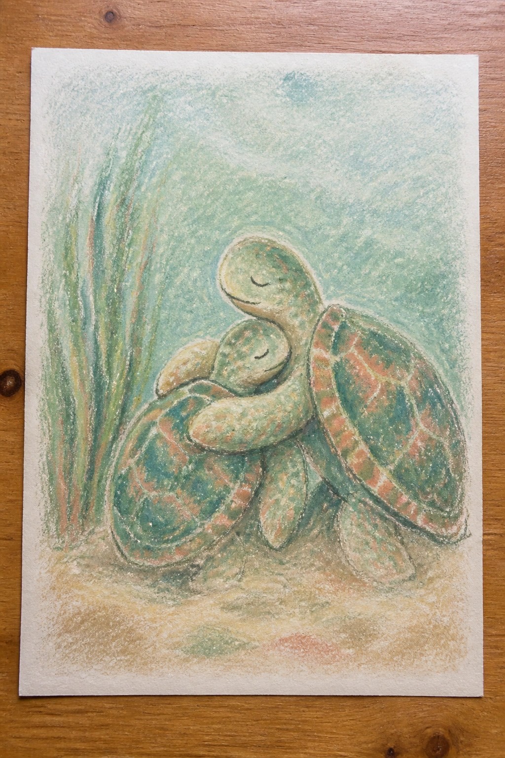 Two sea turtles hugging underwater in soft green pastel illustration with seaweed