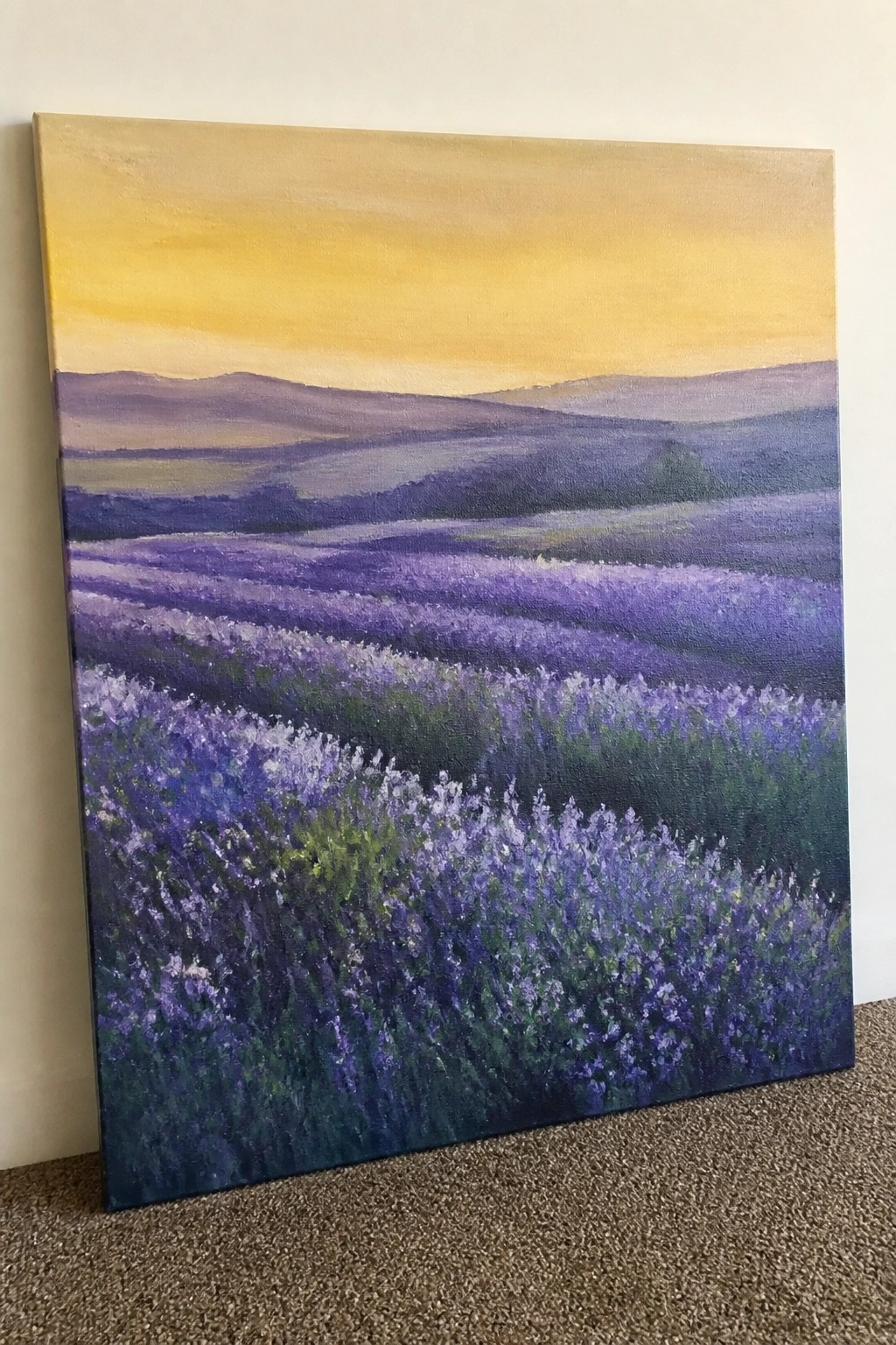 Vibrant painting of purple lavender fields across rolling hills under golden sunset sky