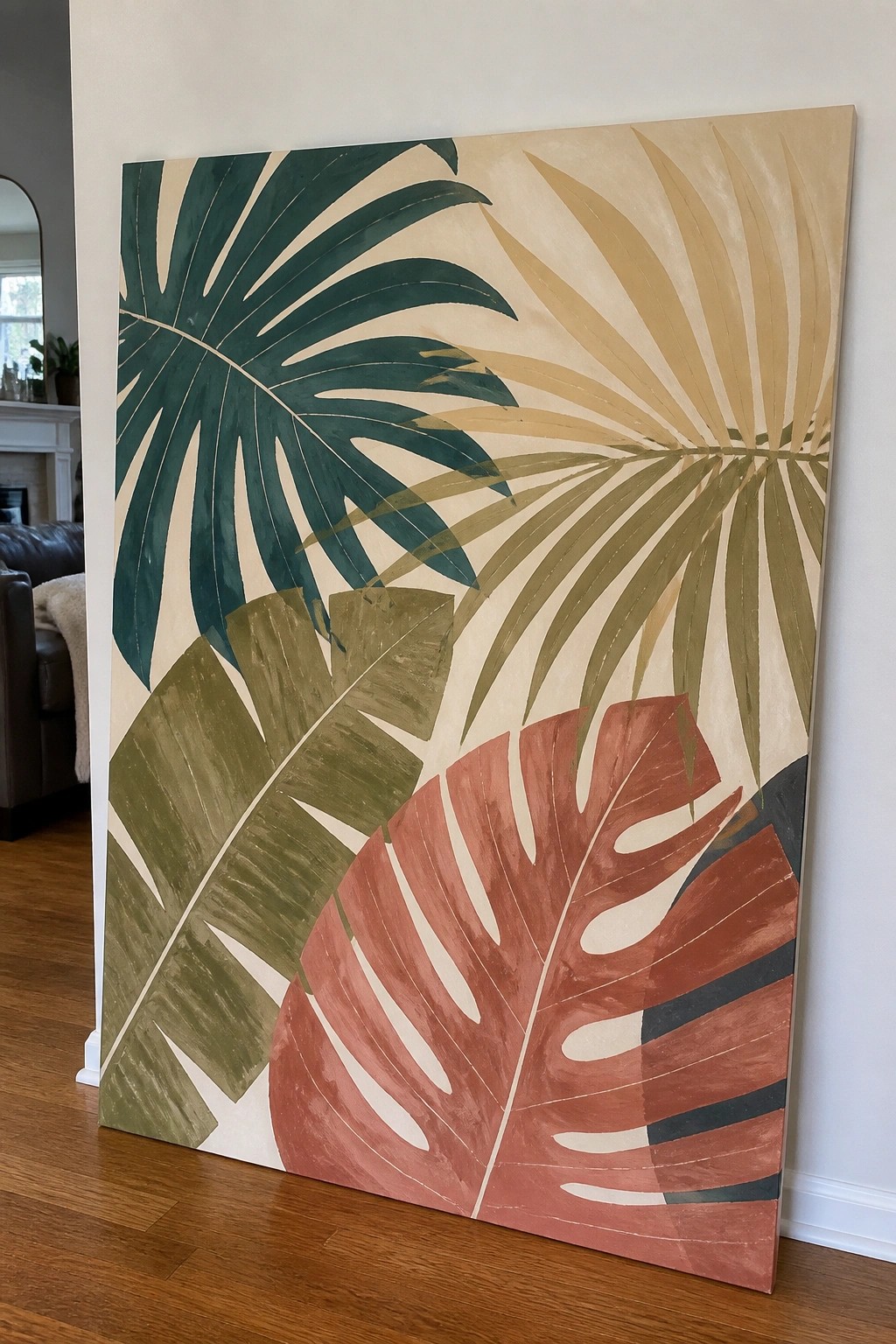 Large abstract tropical leaf painting in green, terracotta, and beige tones.