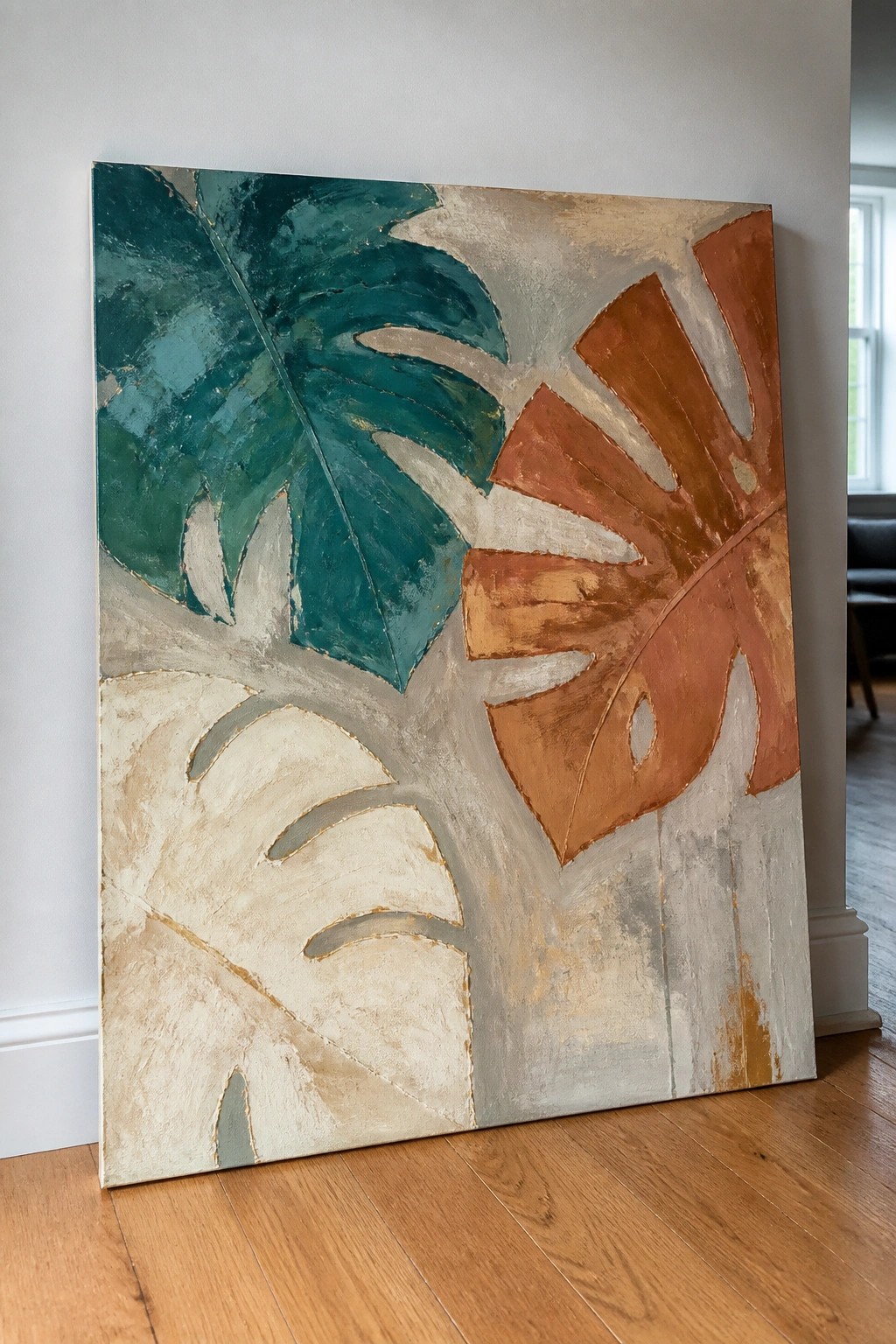 Abstract painting of oversized monstera leaves in teal, orange, beige, and gray tones