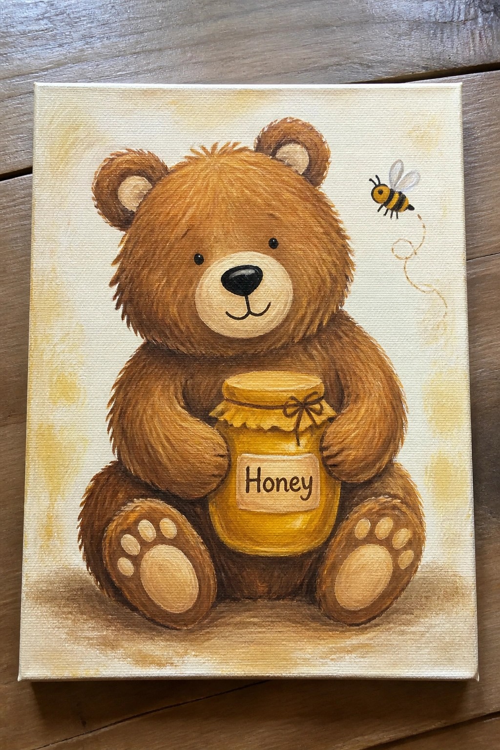 Cute brown teddy bear holding honey jar with bee flying nearby on canvas