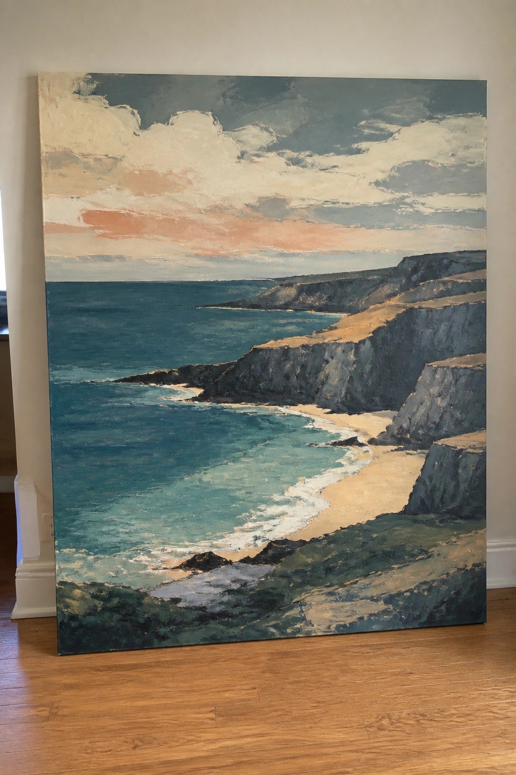 Oil painting of turquoise ocean waves on sandy beach with steep cliffs under cloudy sunset sky