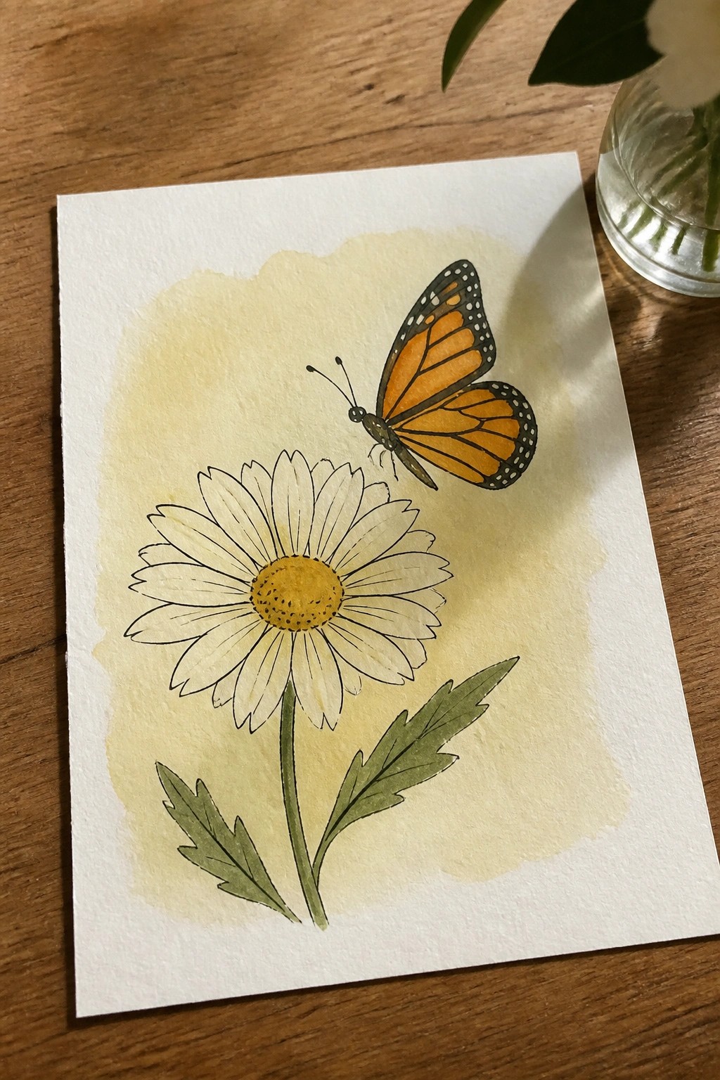 Watercolor painting of white daisy with yellow center and orange monarch butterfly