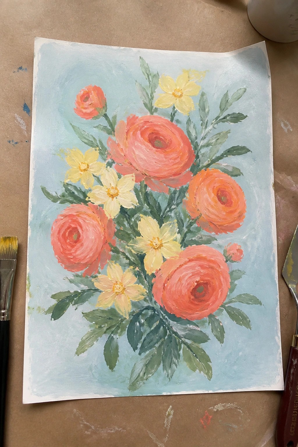 Vibrant painting of coral ranunculus and yellow flowers with green leaves on blue background