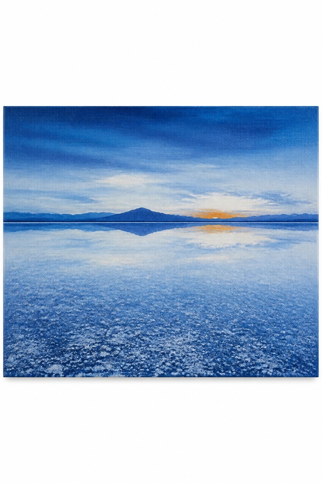 Acrylic painting of a blue lake at sunset with mountains reflected in the water and textured foreground.