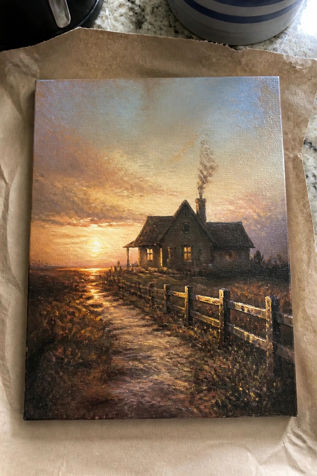 Painting of cottage at sunset with smoking chimney, dirt path and wooden fence