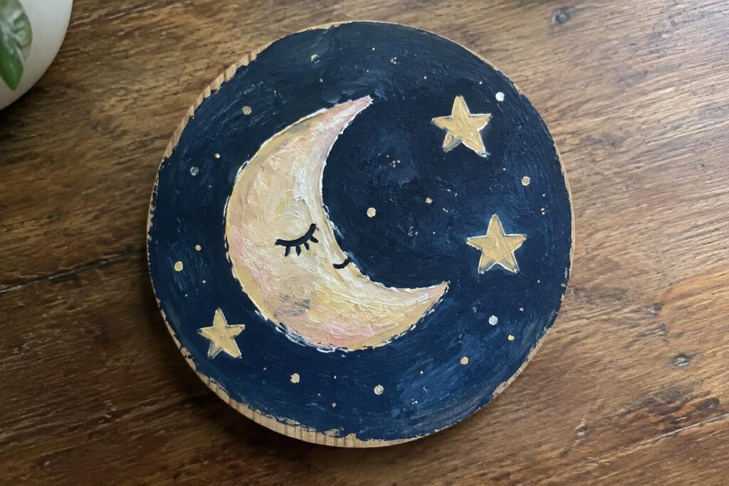 18 Creative Mini Canvas Painting Ideas Using Circle and Rectangle Formats Hand-painted wooden disc with sleepy crescent moon, yellow stars on dark blue sky