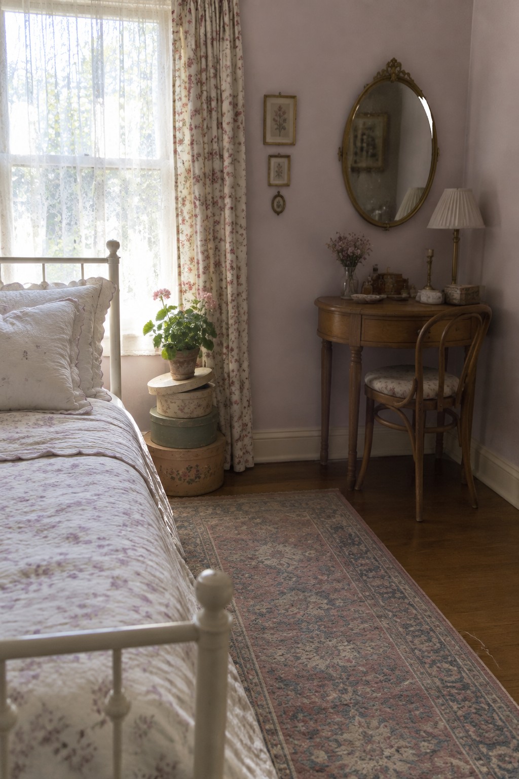 A small bedroom with pale lavender walls and warm wood furniture.