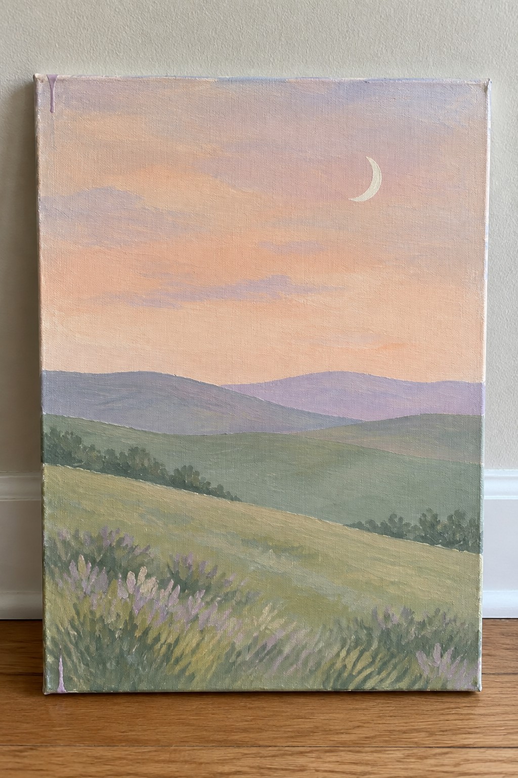 Painting of rolling green hills with purple flowers under a crescent moon in pastel sky.