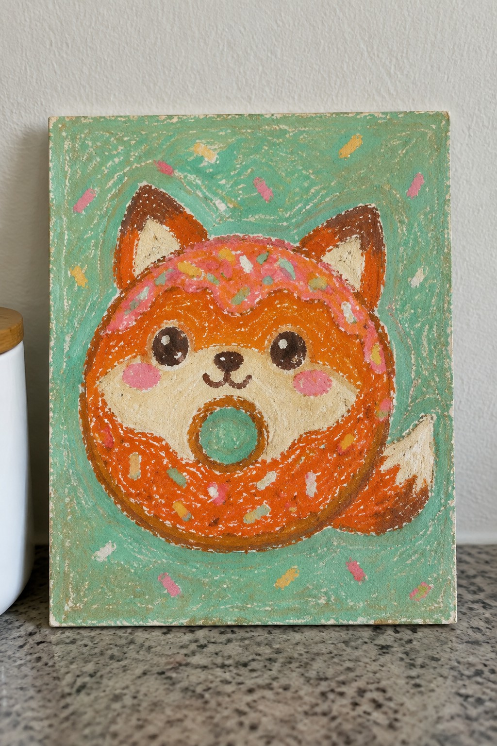 Cute orange fox donut painting with pink icing and sprinkles on green canvas