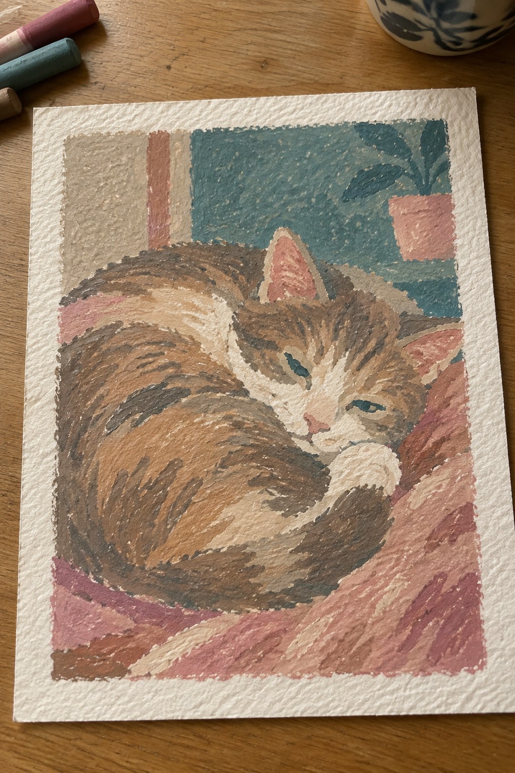 Sleeping tabby cat curled on pink fabric in textured pastel artwork