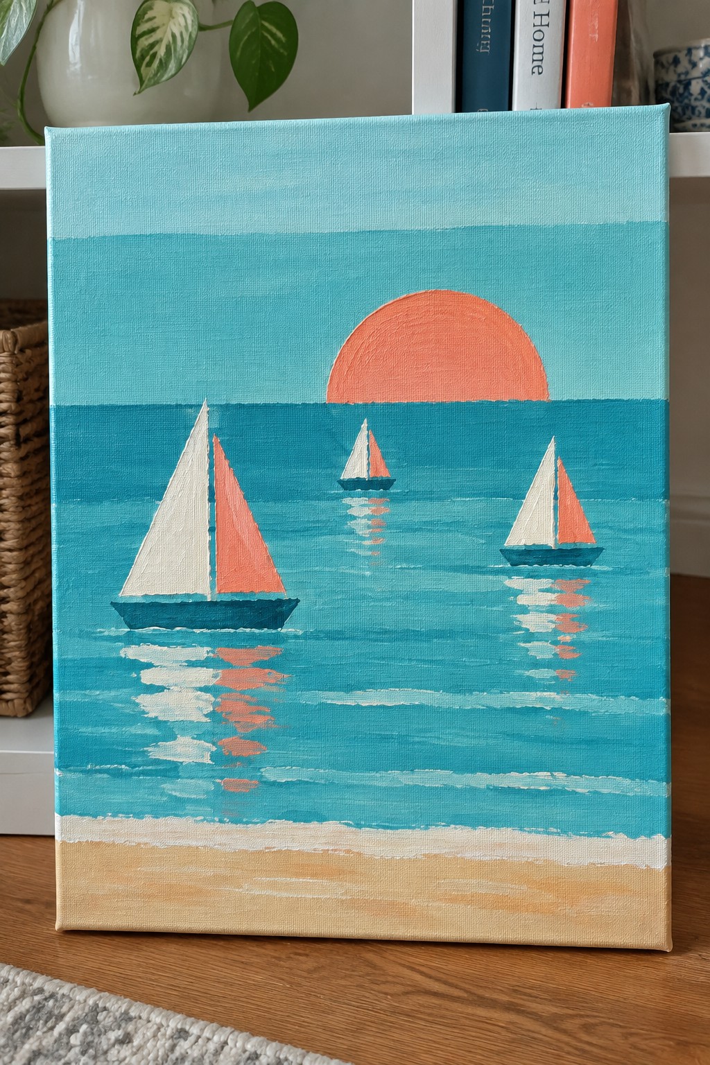 Three sailboats with coral sails on turquoise sea under large orange sun with sandy shore.