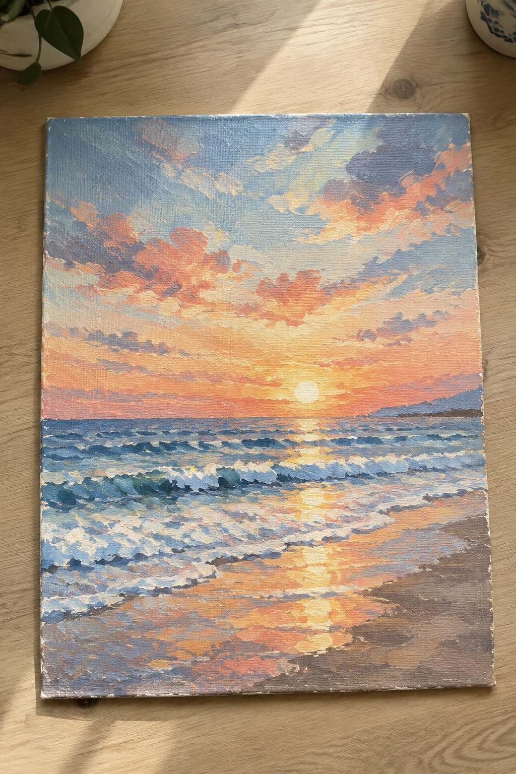 Colorful sunset painting with sun over ocean waves on sandy beach at dusk