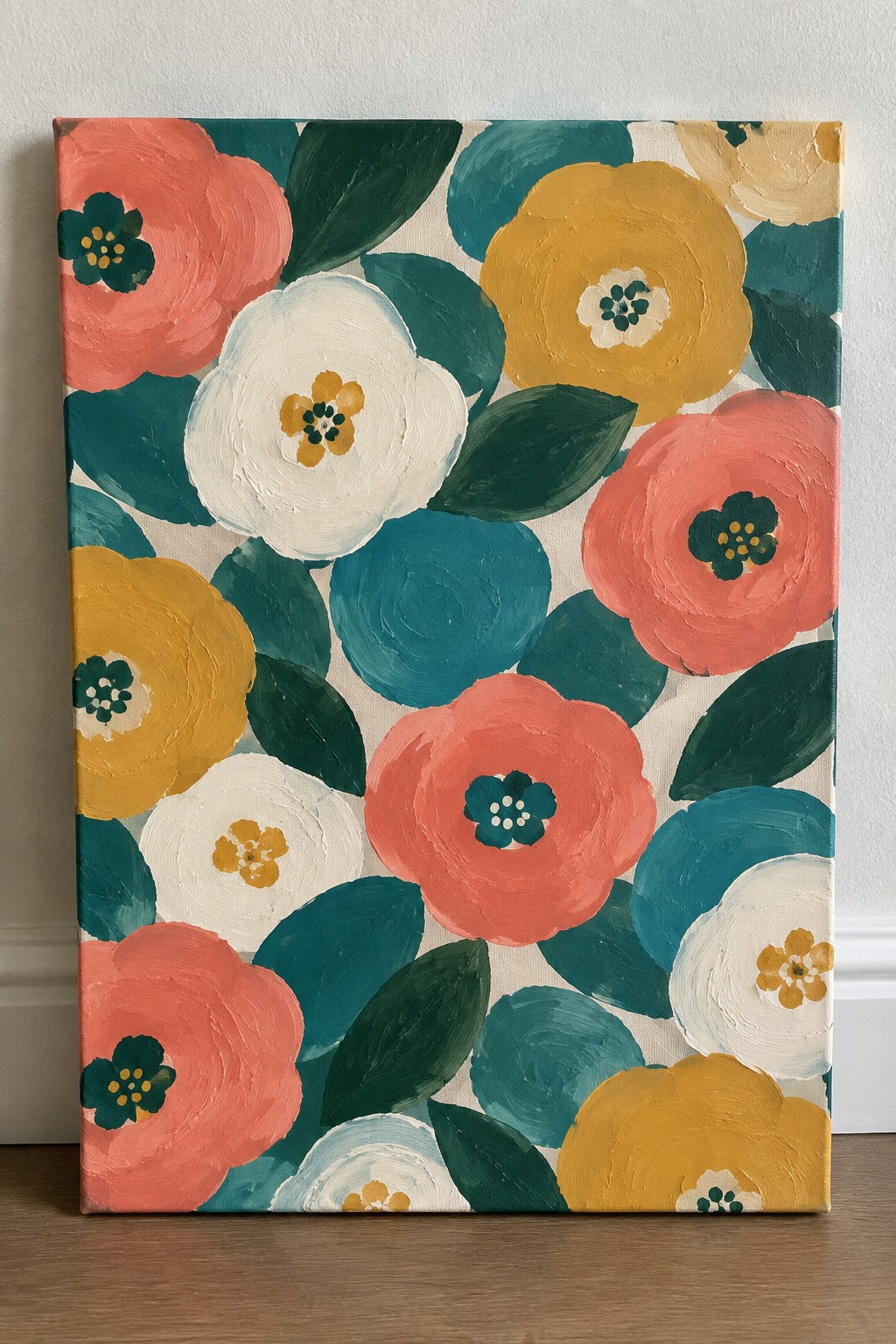Vibrant floral painting on canvas with coral, yellow, white, and teal blooms.