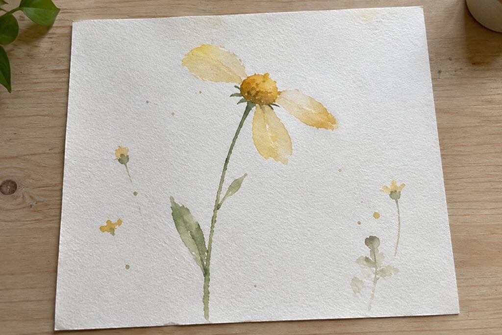 Watercolor of tall yellow flower with orange center, green stem, and small blooms