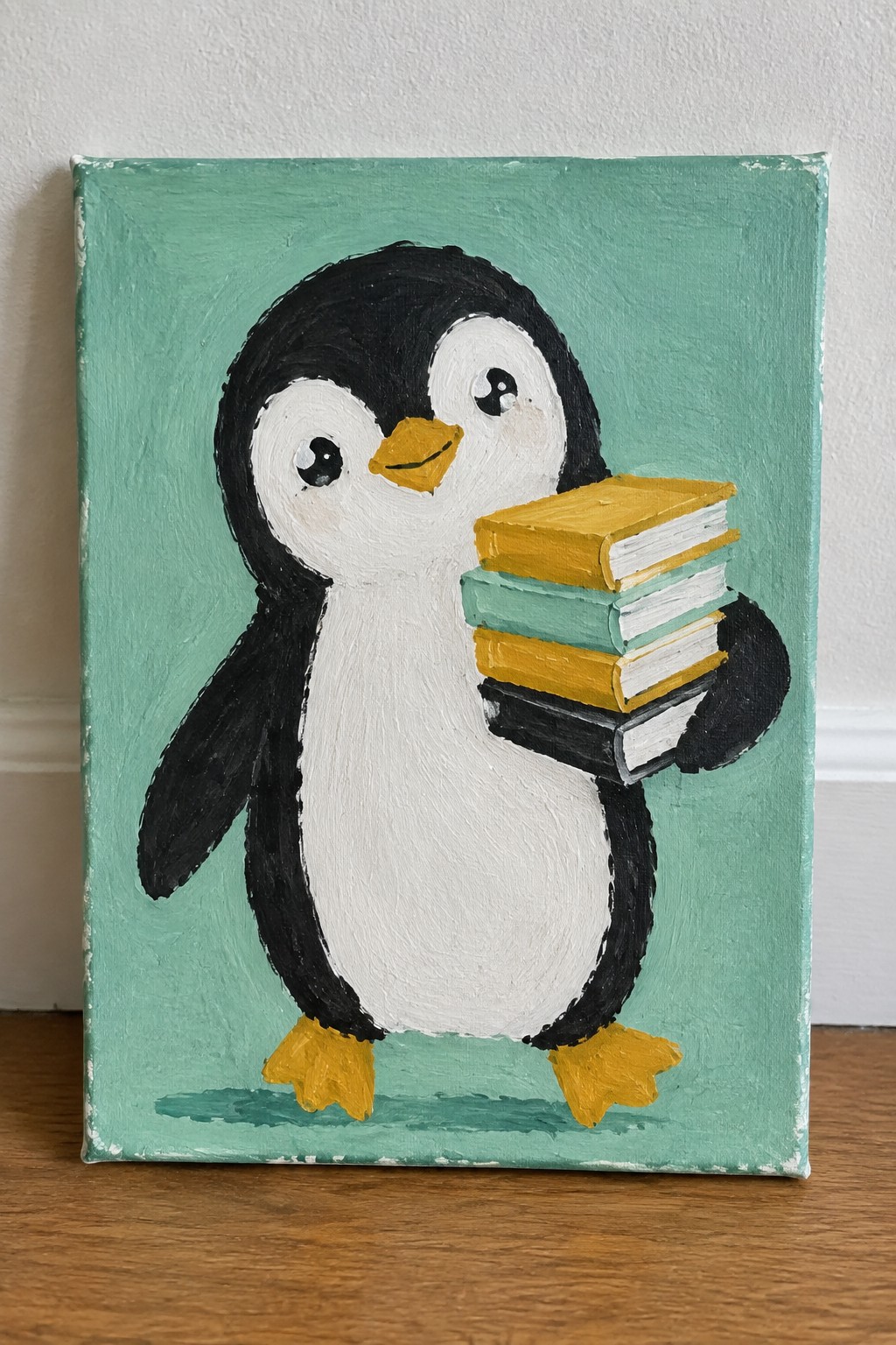 A painting of a black and white penguin holding a stack of yellow and teal books against a solid teal background.
